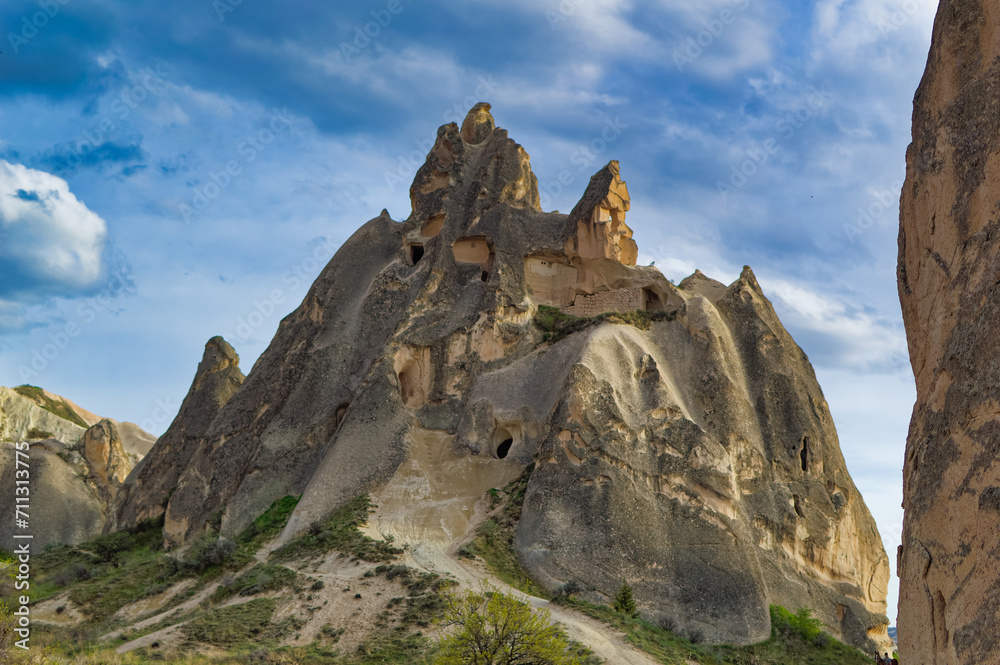 Typical Cappadocia landscape soft volcanic rock, shaped by erosion in Goreme, Turkey.