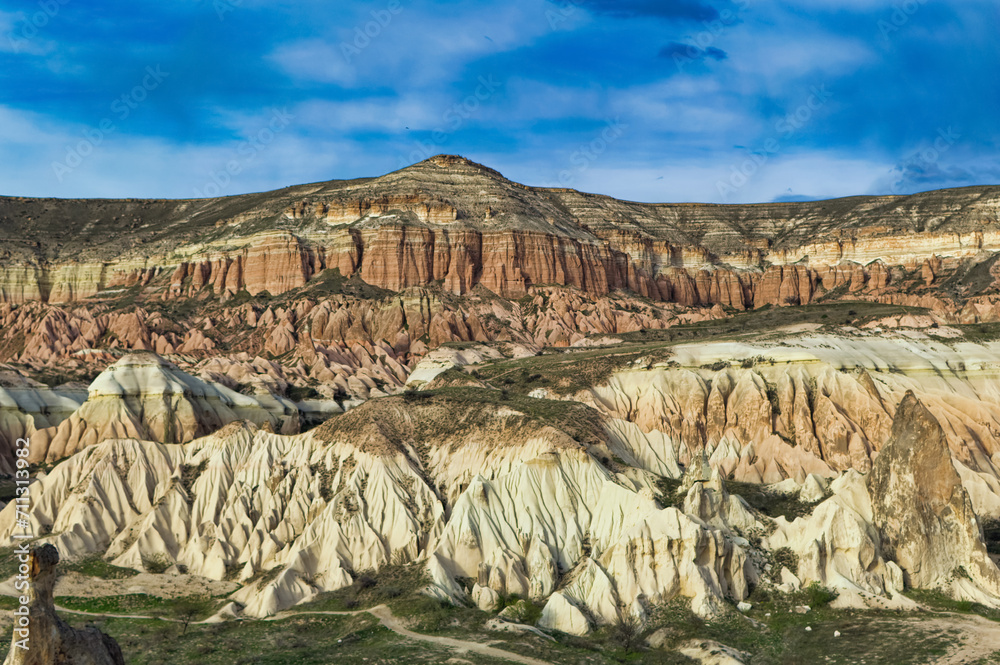 Typical Cappadocia landscape soft volcanic rock, shaped by erosion in Goreme, Turkey.