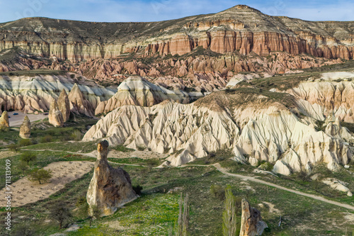 Typical Cappadocia landscape soft volcanic rock, shaped by erosion in Goreme, Turkey.