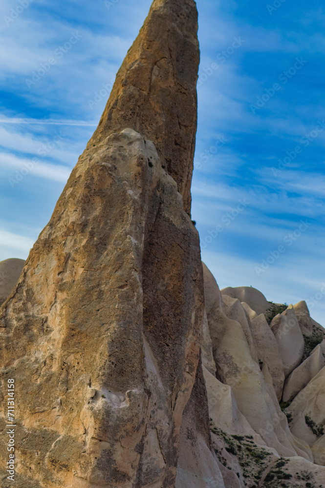 Typical Cappadocia landscape soft volcanic rock, shaped by erosion in Goreme, Turkey.