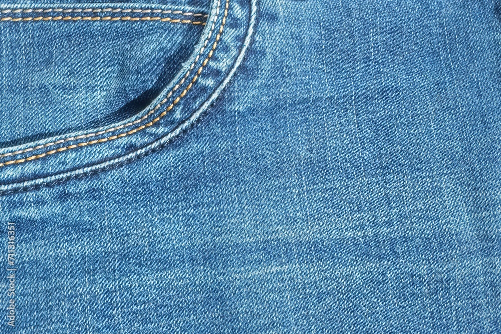 Jeans, denim close-up, seam with yellow threads. Jeans, denim close-up, seam with yellow threads.