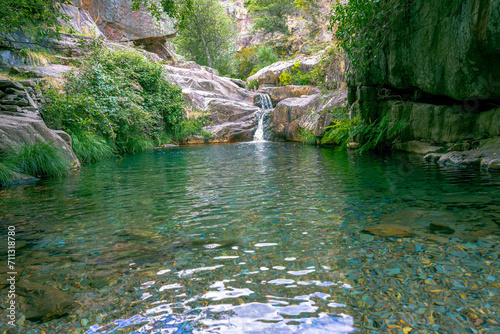 waterfall and natural pool in the uninhabited village of Drave  the most isolated village in Portugal.