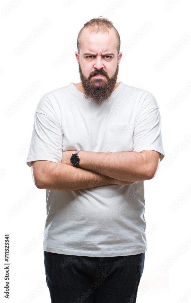 Young caucasian hipster man wearing casual t-shirt over isolated background skeptic and nervous, disapproving expression on face with crossed arms. Negative person. Young caucasian hipster man wearing casual t-shirt over isolated background skeptic and nervous, disapproving expression on face with crossed arms. Negative person.