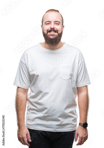 Young caucasian hipster man wearing casual t-shirt over isolated background with a happy and cool smile on face. Lucky person.