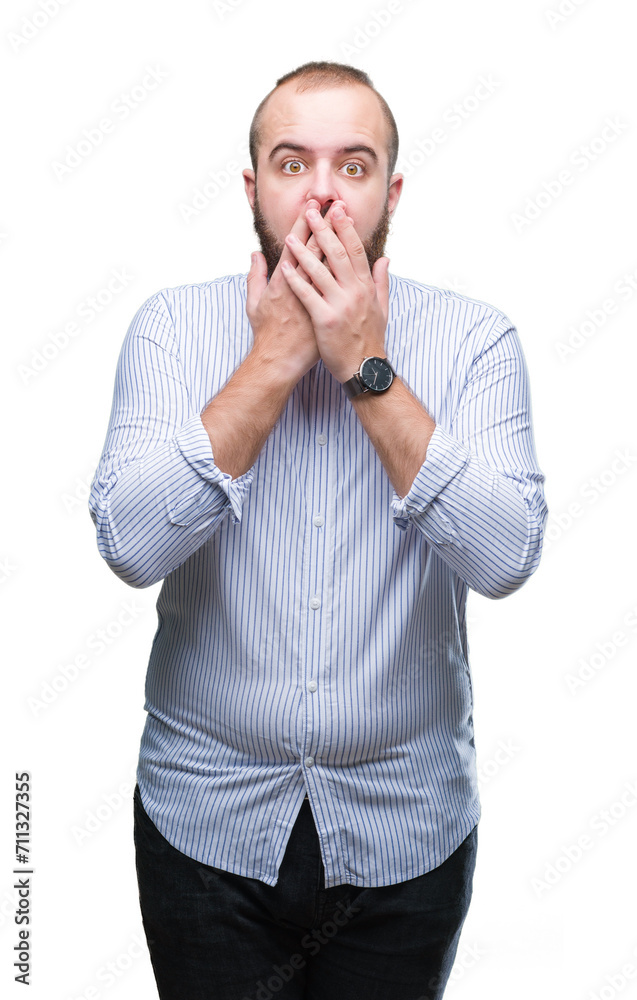 Young caucasian hipster man over isolated background shocked covering mouth with hands for mistake. Secret concept. Young caucasian hipster man over isolated background shocked covering mouth with hands for mistake. Secret concept.