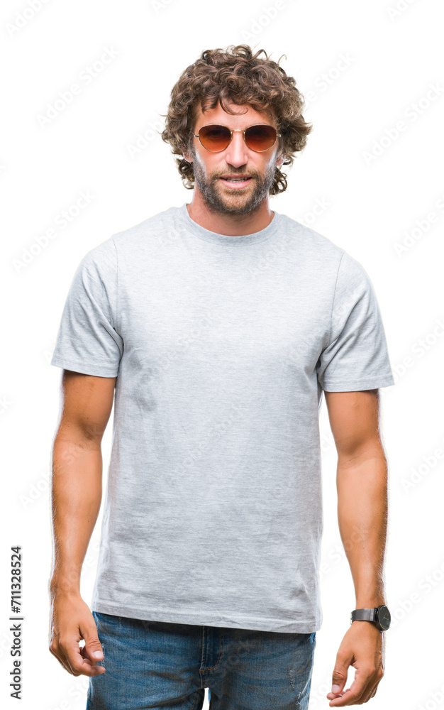 Handsome hispanic model man wearing sunglasses over isolated background with a happy and cool smile on face. Lucky person. Handsome hispanic model man wearing sunglasses over isolated background with a happy and cool smile on face. Lucky person.