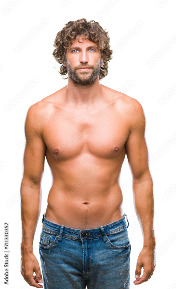 Fototapeta premium Handsome hispanic model man sexy and shirtless over isolated background with serious expression on face. Simple and natural looking at the camera.