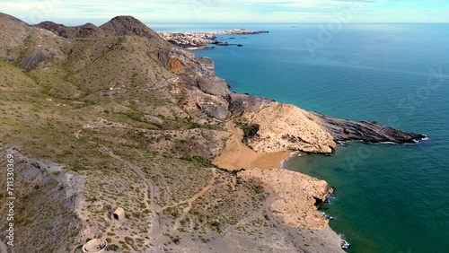 Calblanque coast aerial drone view point of coastline of mountains against mediterranean seascape in Cartagena coasts, Spain. photo
