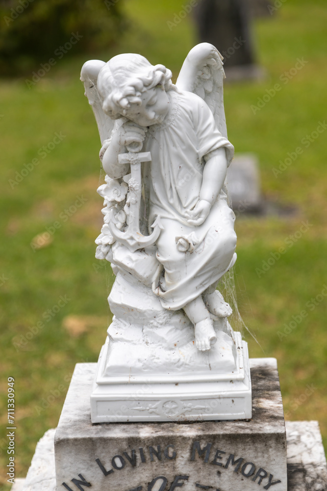 Angel statue in a cemetery in Russell, Northland, New Zealand.