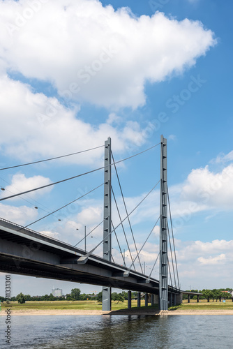 Bridge over the Rhine river in Dusseldorf, bridge between Oberkassel and old town of Dusseldorf photo