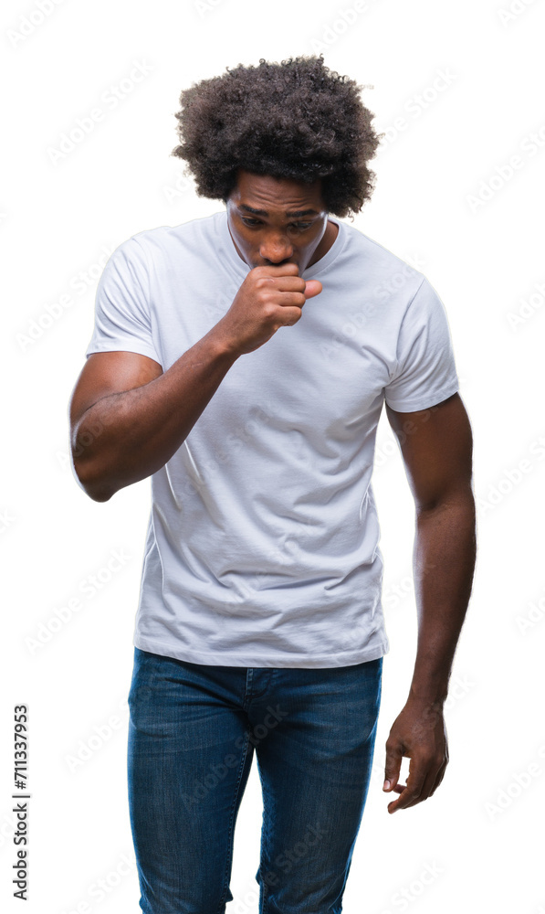 Afro american man over isolated background feeling unwell and coughing as symptom for cold or bronchitis. Healthcare concept.