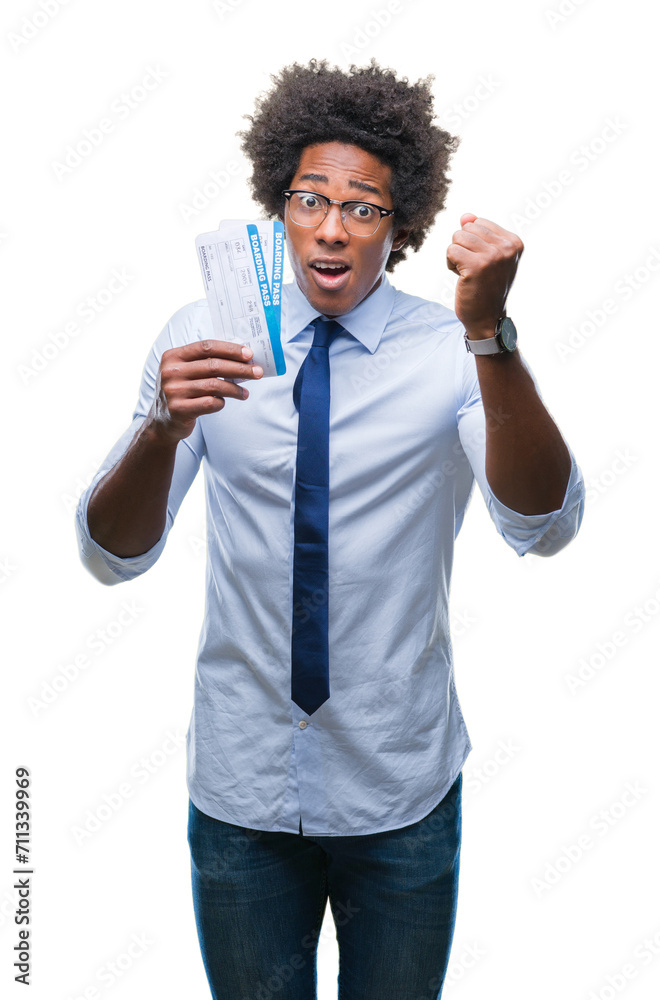 Afro american man holding boarding pass over isolated background annoyed and frustrated shouting with anger, crazy and yelling with raised hand, anger concept Afro american man holding boarding pass over isolated background annoyed and frustrated shouting with anger, crazy and yelling with raised hand, anger concept