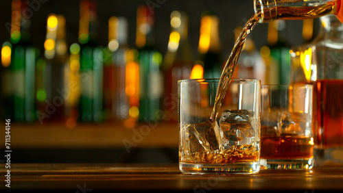 Close-up of pouring whiskey...