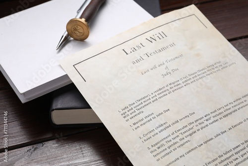 Last Will and Testament, books, stamp seal and pen on wooden table, closeup photo