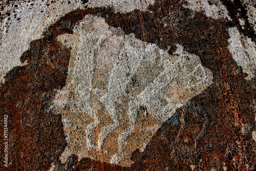 Cave paintings of ancient people, petroglyphs. Archaeological site, Zalavruga, Republic of Karelia. Russia. photo