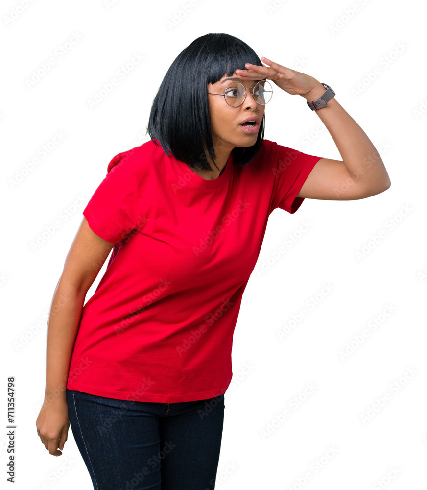 Beautiful young african american woman wearing glasses over isolated background very happy and smiling looking far away with hand over head. Searching concept. Beautiful young african american woman wearing glasses over isolated background very happy and smiling looking far away with hand over head. Searching concept.