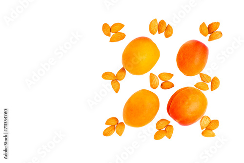 Fototapeta Naklejka Na Ścianę i Meble -  Yellow orange ripe apricot fruits and pits kernels, healthy and tasty