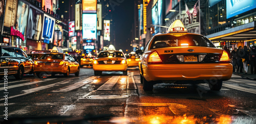 Billede på lærred new york cabs on the street at night