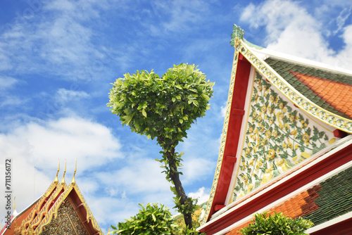 Heart shape tree with a Thailand temple Wat Pho Bangkok