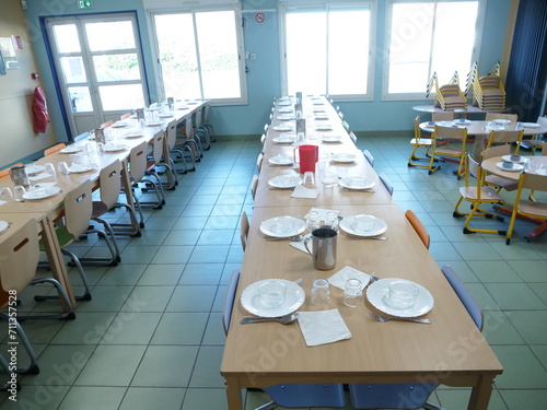 An empty children's canteen before noon. Le Mans, France - January 17, 2024.