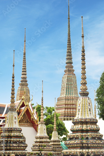 Wat Pho Temple of Thailand Bangkok Beautiful Garden with Blue Sky and Colorful Tree