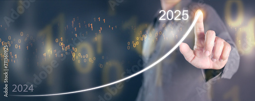 Happy new year 2025. A man draws a rising graph, line, from the end of 2024 rises to the start of 2025. New coming year, journey, of improvement and success. photo