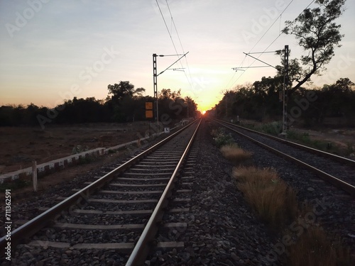 railway in sunset. railway track over sunset.