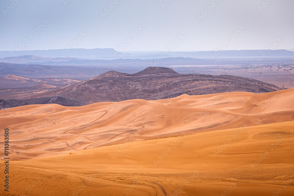 Fototapeta premium Colorful desert dunes with beautiful background in Sahara, Merzouga, Morocco