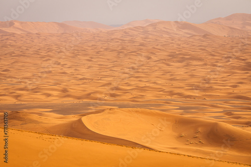 Colorful desert dunes with beautiful background in Sahara, Merzouga, Morocco © danmir12