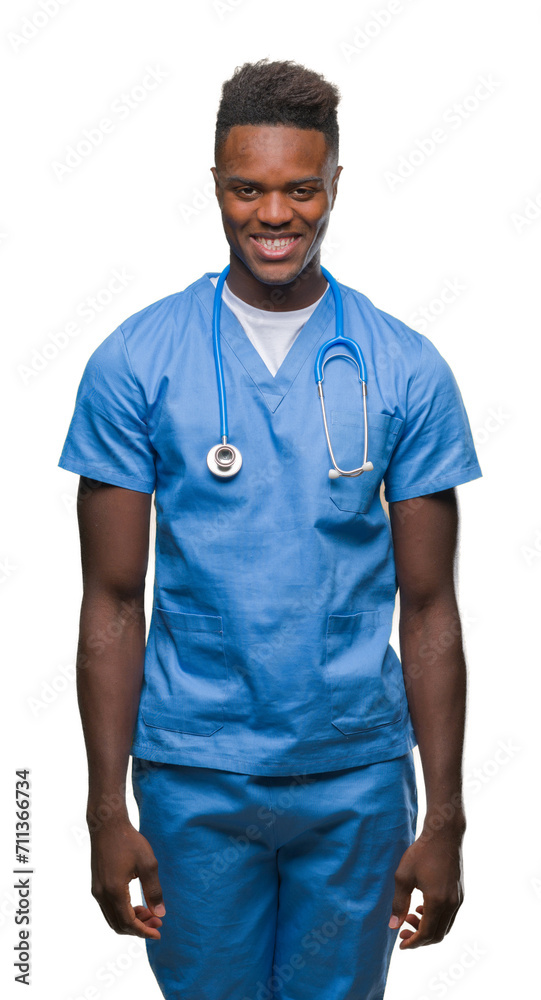 Fototapeta premium Young african american doctor man over isolated background wearing surgeon uniform with a happy and cool smile on face. Lucky person.