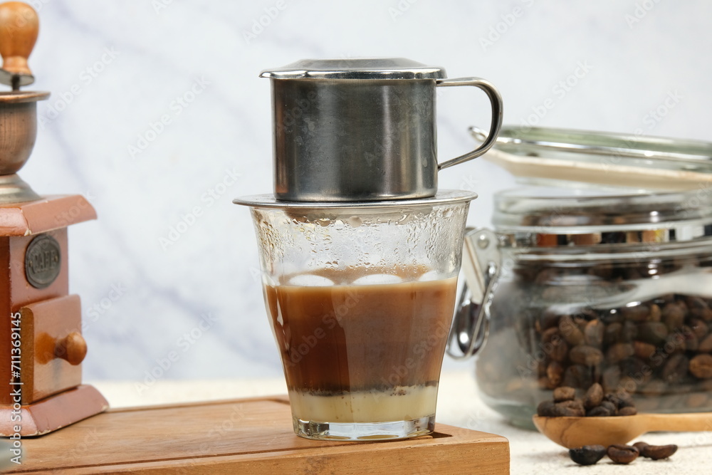 Vietnamese coffee made with a traditional Vietnamese coffee dripper Vietnamese coffee made with a traditional Vietnamese coffee dripper