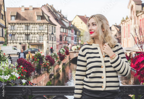 Vacation in France. Concept of tourism and holidays. Woman in city scene
