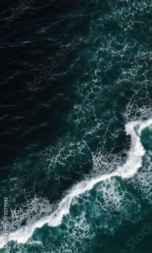 Aerial View of Ocean Waves Texturing Deep Blue Sea
