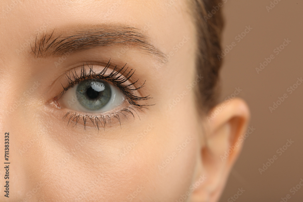 Woman with long eyelashes after mascara applying, closeup Woman with long eyelashes after mascara applying, closeup