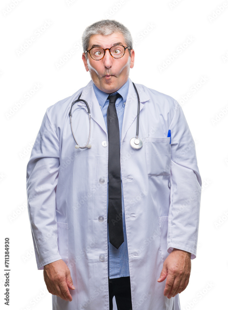 Handsome senior doctor man over isolated background making fish face with lips, crazy and comical gesture. Funny expression. Handsome senior doctor man over isolated background making fish face with lips, crazy and comical gesture. Funny expression.