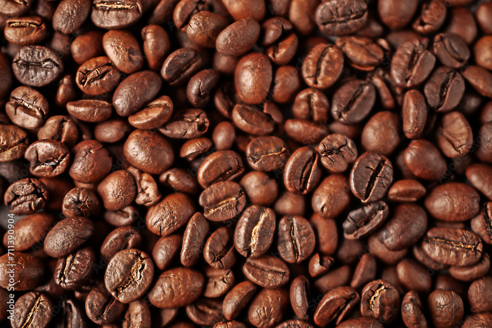 Top view of aromatic brown coffee beans lying on surface Top view of aromatic brown coffee beans lying on surface