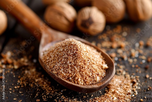 bunch of grated nutmeg on a wooden spoon