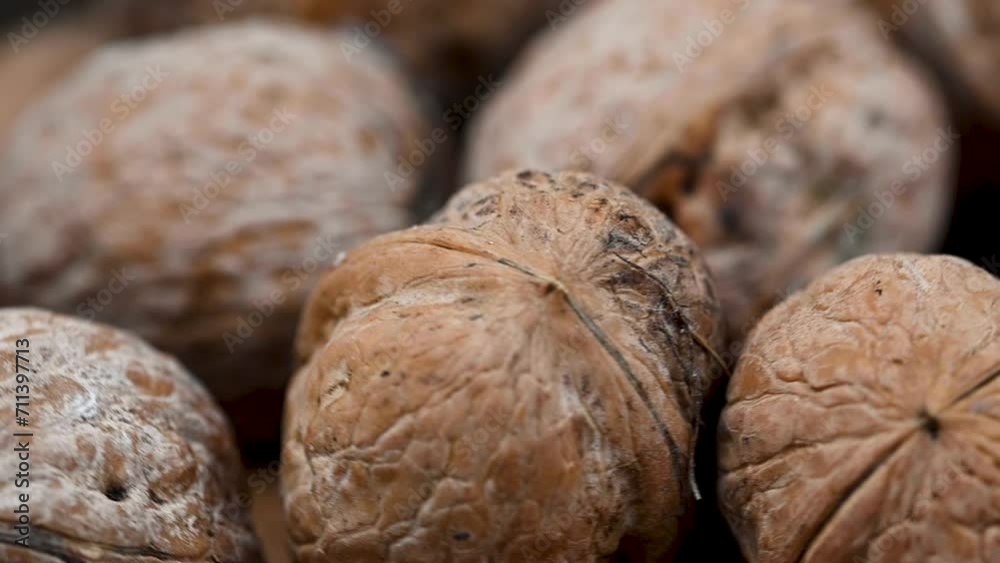 Walnuts kernel macro shot. Whole walnuts in a bowl. Macro shot Walnuts kernel macro shot. Whole walnuts in a bowl. Macro shot