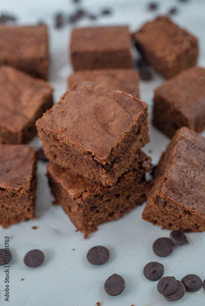 Chocolate frosted brownies on a ceramic plate Chocolate frosted brownies on a ceramic plate