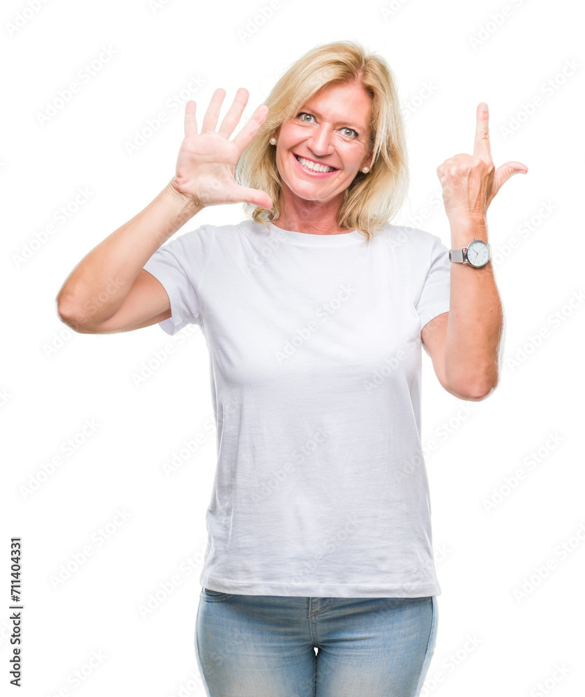 Middle age blonde woman over isolated background showing and pointing up with fingers number seven while smiling confident and happy. Middle age blonde woman over isolated background showing and pointing up with fingers number seven while smiling confident and happy.