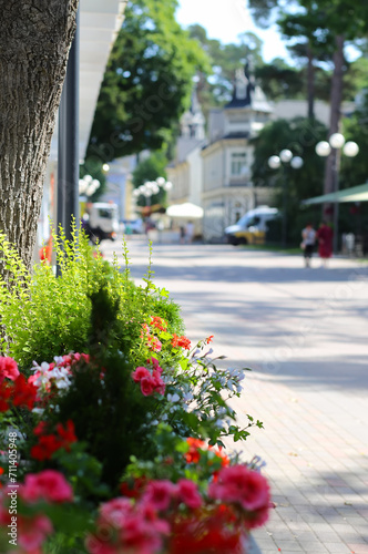 JURMALA. LATVIA -28 June, 2023 central street and old wooden buildings, church in the town. Summer rest and relaxation photo