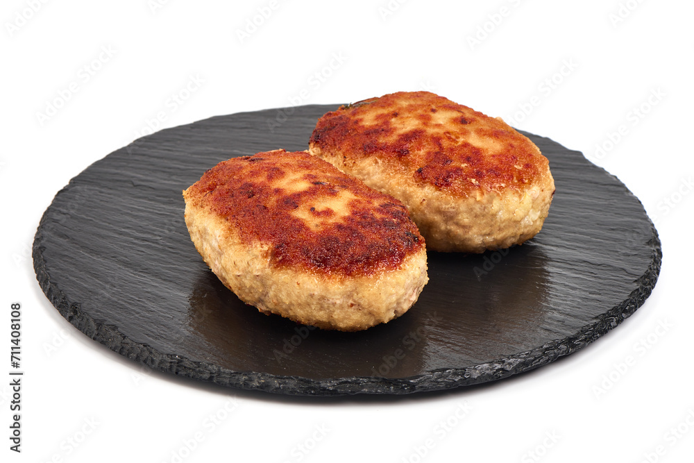 Homemade fried pork cutlets in breadcrumbs, meatballs from minced meat, isolated on white background.