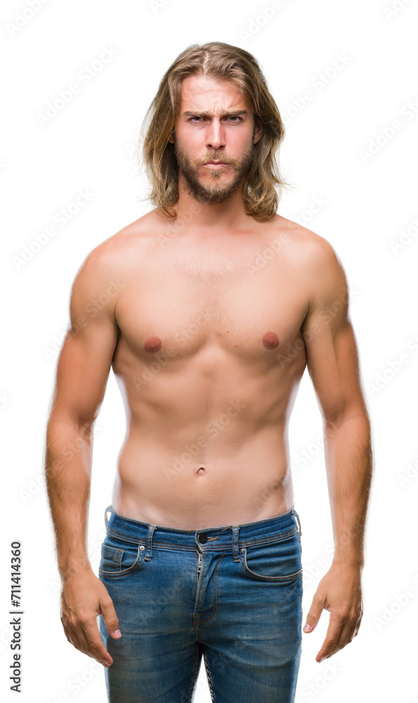 Fototapeta premium Young handsome shirtless man with long hair showing sexy body over isolated background skeptic and nervous, frowning upset because of problem. Negative person.