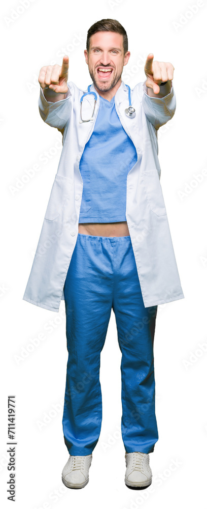 Handsome doctor man wearing medical uniform over isolated background Pointing to you and the camera with fingers, smiling positive and cheerful Handsome doctor man wearing medical uniform over isolated background Pointing to you and the camera with fingers, smiling positive and cheerful