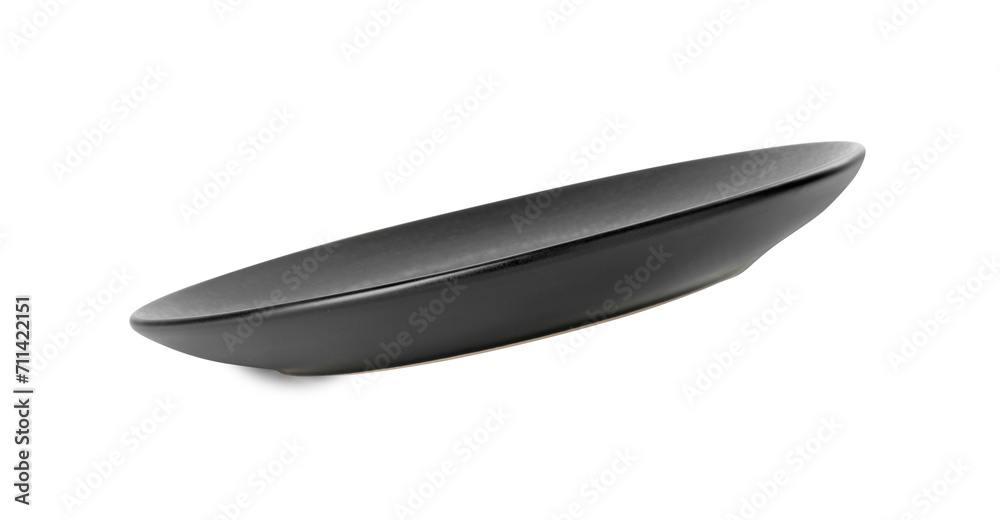One beautiful black plate isolated on white One beautiful black plate isolated on white