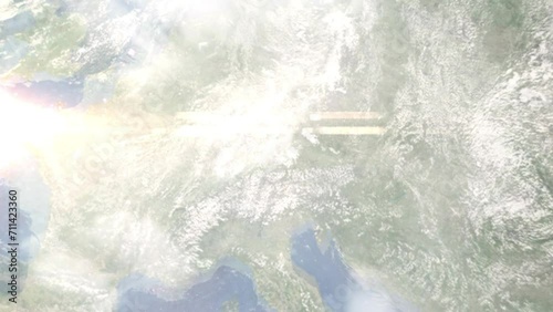 Zoom in from space and focus on Unterschleissheim, Germany. 3D Animation. Background for travel intro. Elements of this image furnished by NASA. photo