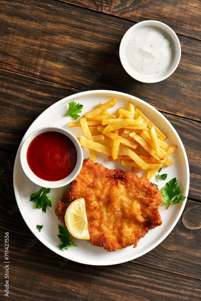 Weiner schnitzel with potato fries Weiner schnitzel with potato fries
