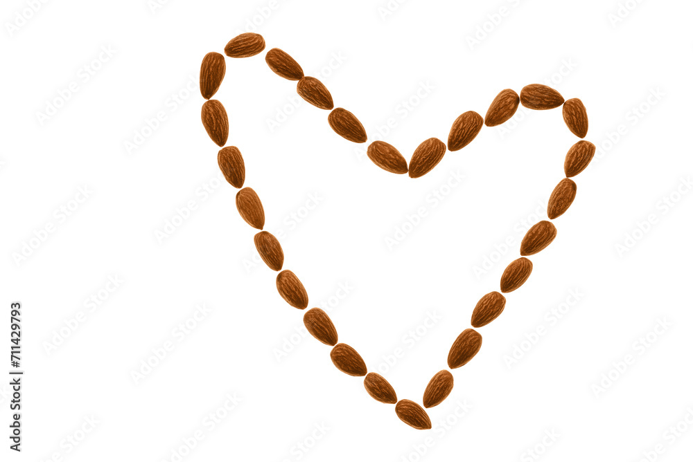 Almonds in the shape of a heart isolated on a white background. Top view, flat lay. Valentine's Day. Almonds in the shape of a heart isolated on a white background. Top view, flat lay. Valentine's Day.