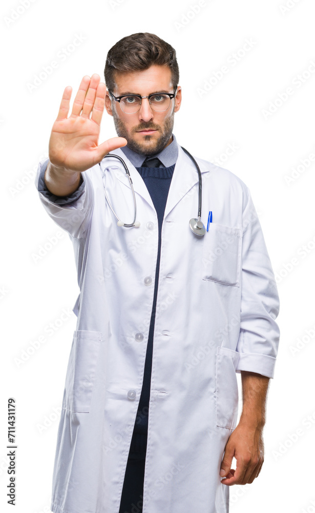 Young handsome doctor man over isolated background doing stop sing with palm of the hand. Warning expression with negative and serious gesture on the face. Young handsome doctor man over isolated background doing stop sing with palm of the hand. Warning expression with negative and serious gesture on the face.
