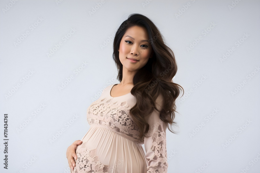 asian pregnant woman posing isolated on white background asian pregnant woman posing isolated on white background